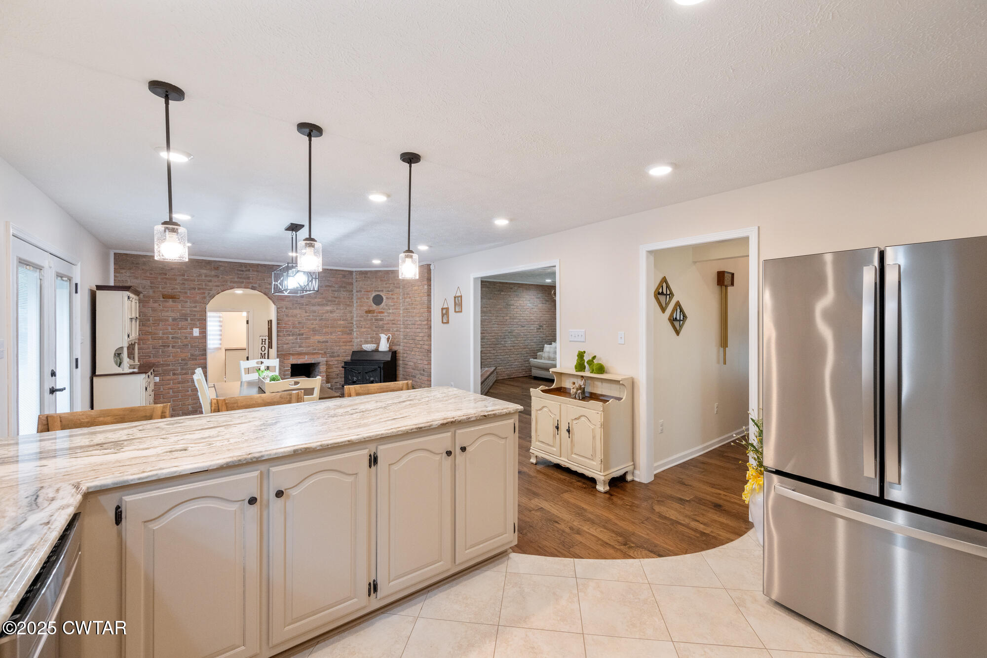 105 Center Hill-Wright Road Reagan, TN 38368 - Photo 19 of 42 a view of a kitchen with kitchen island a counter top space appliances and cabinets