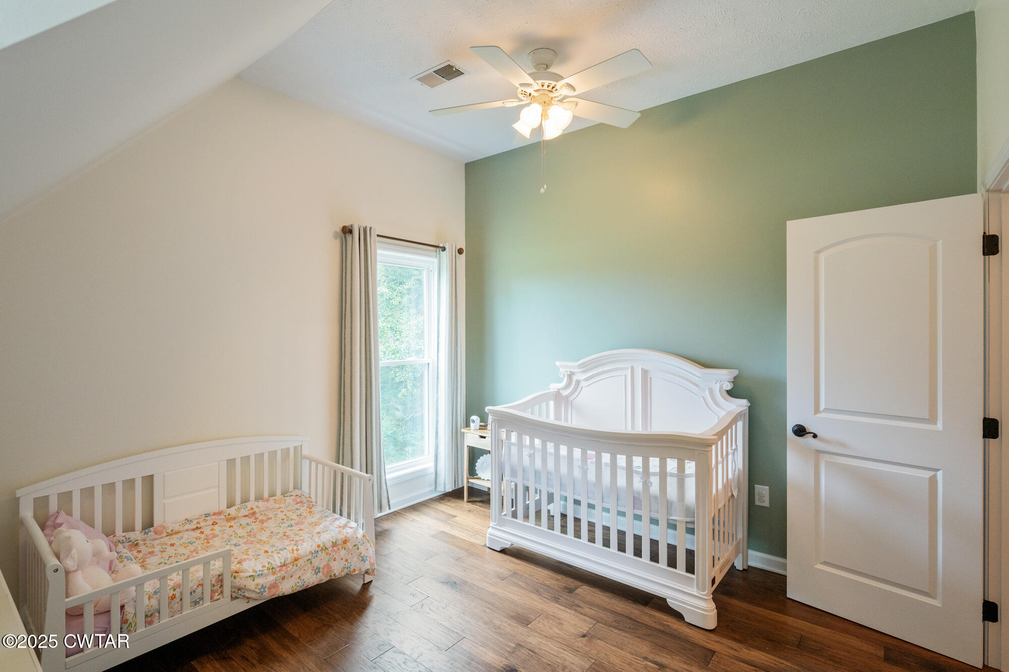 105 Center Hill-Wright Road Reagan, TN 38368 - Photo 26 of 42 a bedroom with a bed and a window