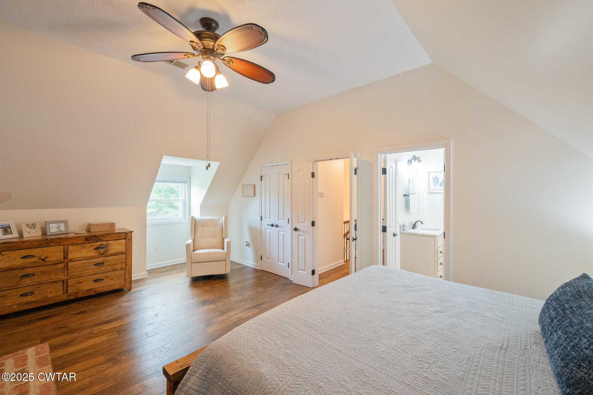105 Center Hill-Wright Road Reagan, TN 38368 - Photo 29 of 42 a bedroom with furniture and wooden floor