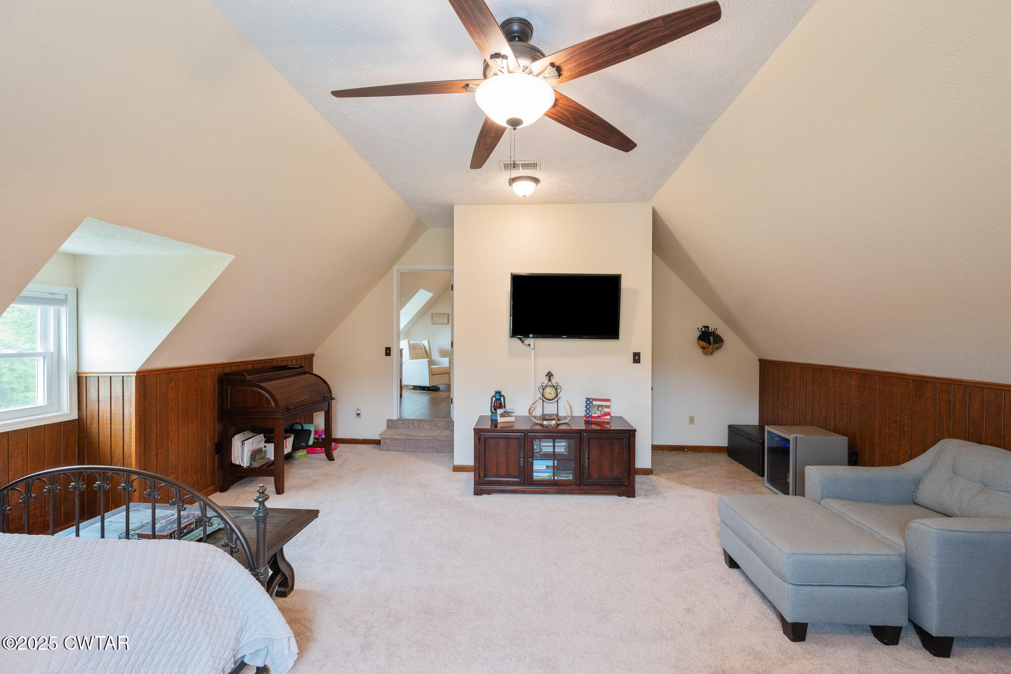 105 Center Hill-Wright Road Reagan, TN 38368 - Photo 33 of 42 a living room with furniture and a flat screen tv