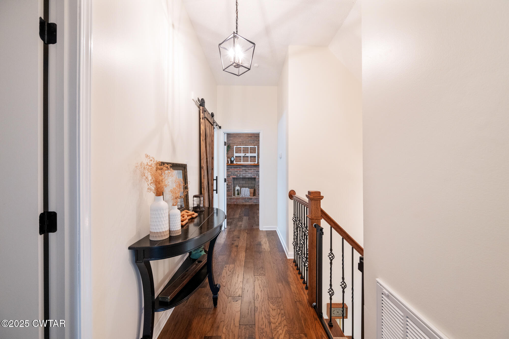 105 Center Hill-Wright Road Reagan, TN 38368 - Photo 35 of 42 a view of a hallway with wooden floor and staircase
