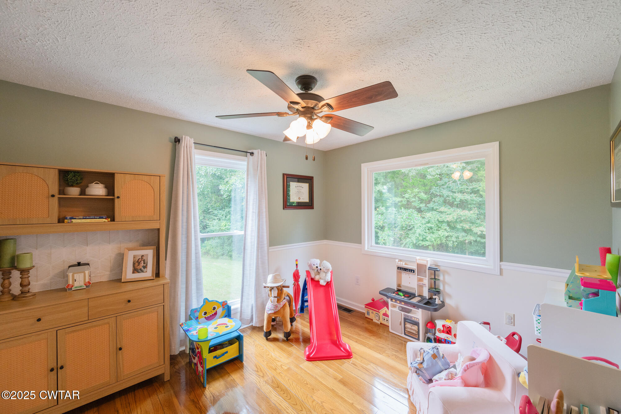 105 Center Hill-Wright Road Reagan, TN 38368 - Photo 36 of 42 a living room with furniture and flat screen tv