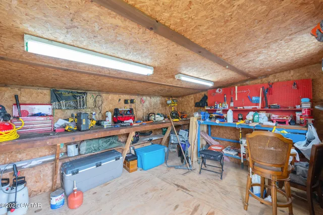 a view of a room with wooden stairs