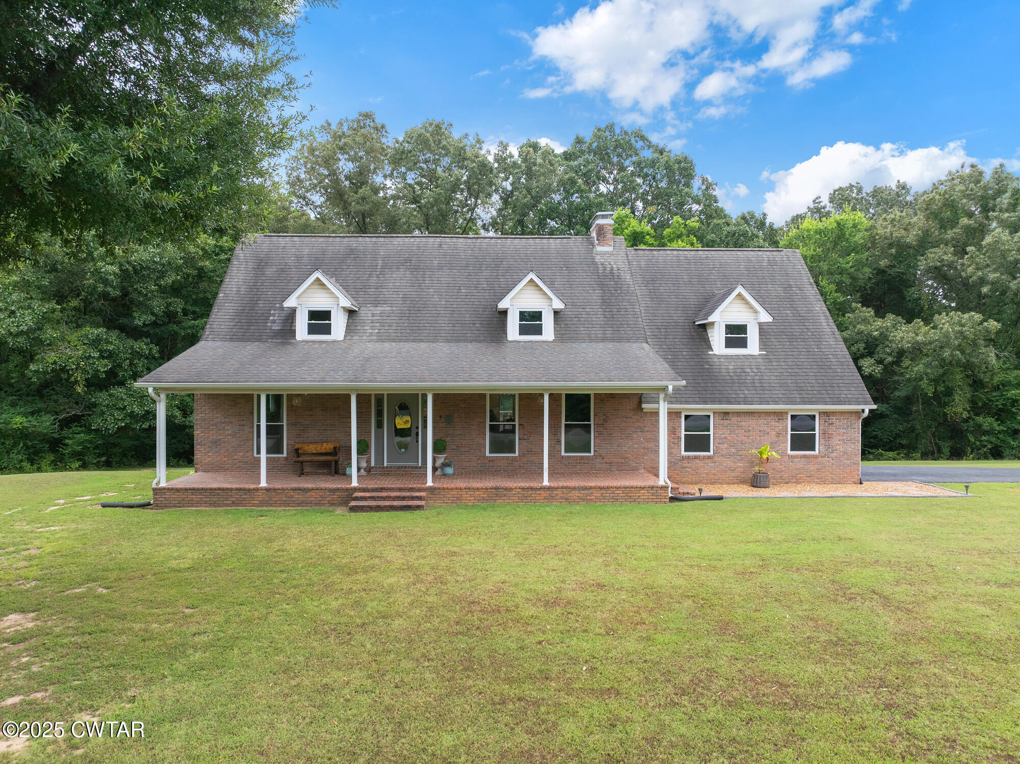 105 Center Hill-Wright Road Reagan, TN 38368 - Photo 6 of 42 front view of a house with a yard