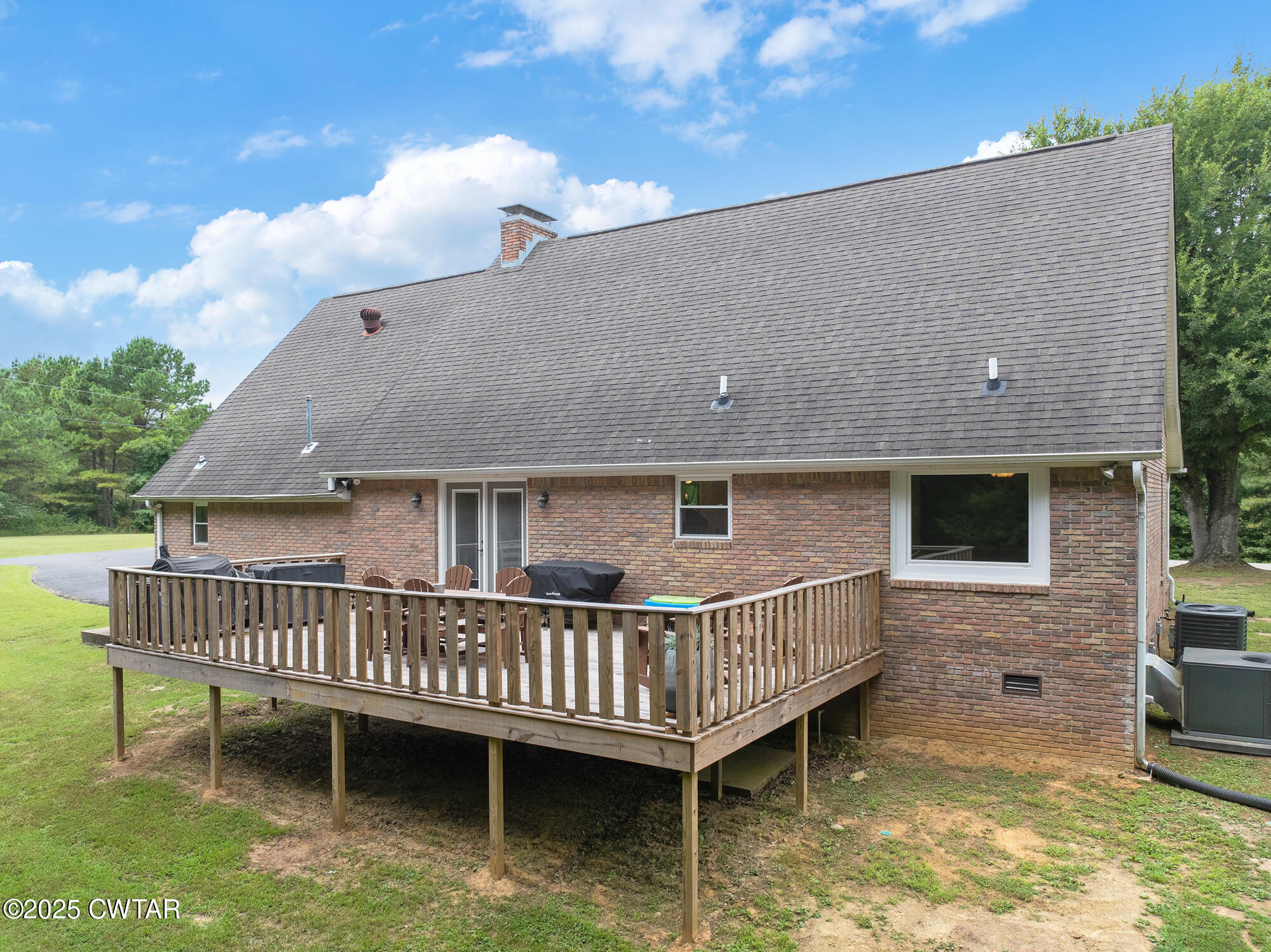 105 Center Hill-Wright Road Reagan, TN 38368 - Photo 9 of 42 a view of a house with a roof deck