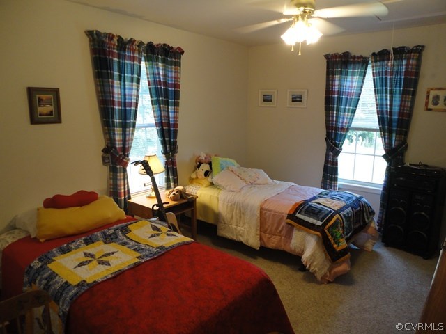 1585 Copper Line Road Bumpass, VA 23024 - Photo 15 of 24 a bedroom with bed and window