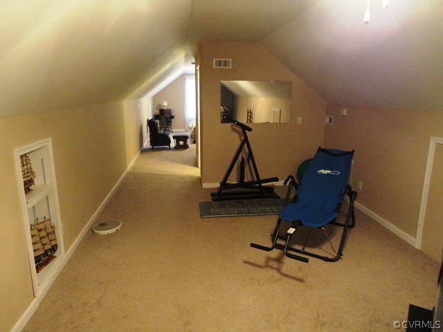 1585 Copper Line Road Bumpass, VA 23024 - Photo 18 of 24 a room with gym equipment and a flat screen tv