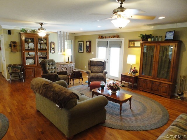 1585 Copper Line Road Bumpass, VA 23024 - Photo 7 of 24 a living room with furniture and wooden floor