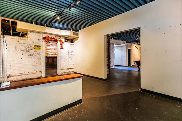 a view of outdoor space with wooden floor