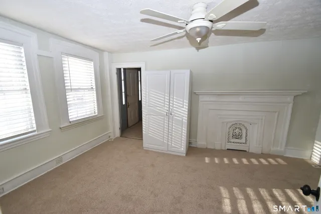 a bathroom with a shower and a toilet