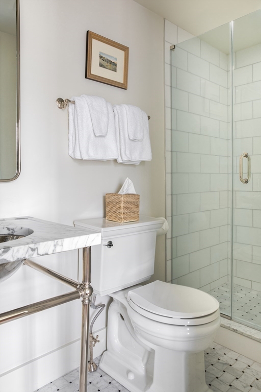 77 Sparks Avenue Nantucket, MA 02554 - Photo 19 of 30 a bathroom with a toilet a sink and a shower