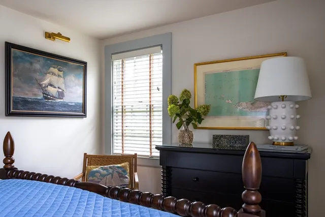 a room with furniture and a potted plant