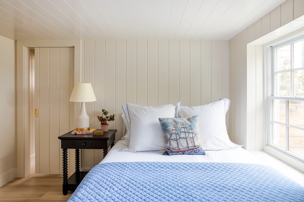 77 Sparks Avenue Nantucket, MA 02554 - Photo 29 of 30 a bed room with a bed and a night stand