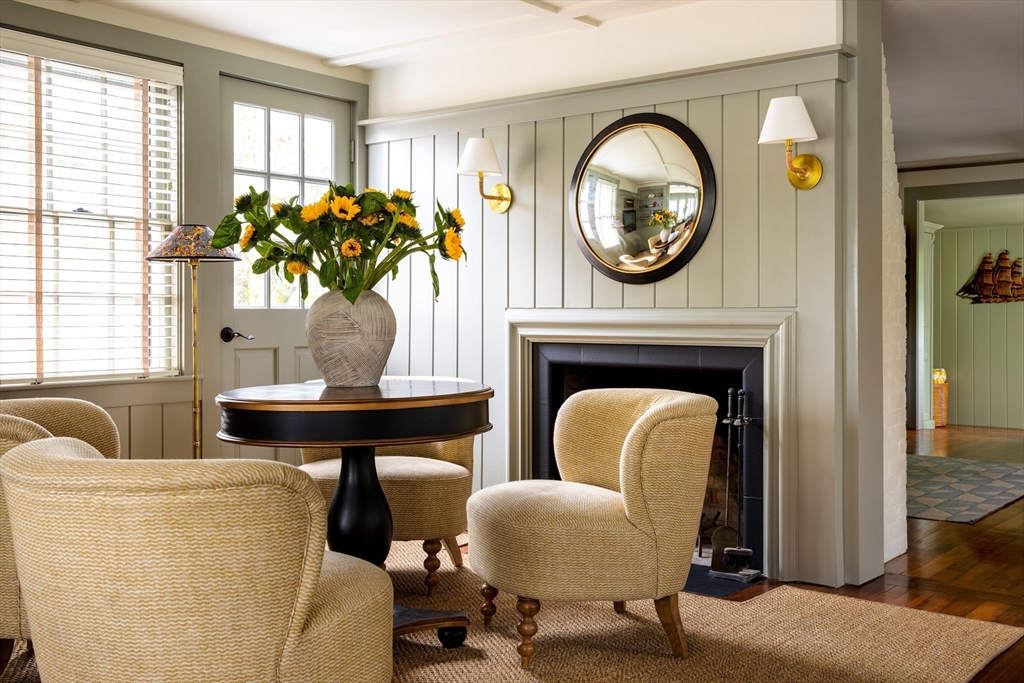 77 Sparks Avenue Nantucket, MA 02554 - Photo 7 of 30 a living room with furniture and a fireplace