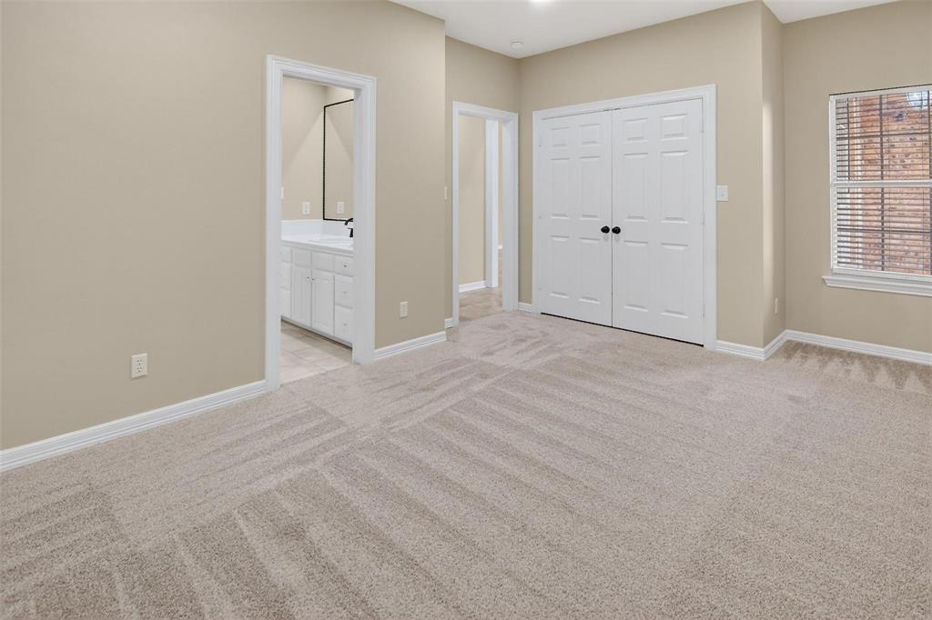 2122 Clear Lake Road Weatherford, TX 76087 - Photo 18 of 31 a view of an empty room with window and cabinet