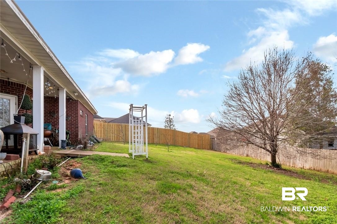 7170 Pierson Drive Mobile, AL 36619 - Photo 23 of 29 View of yard featuring a patio area