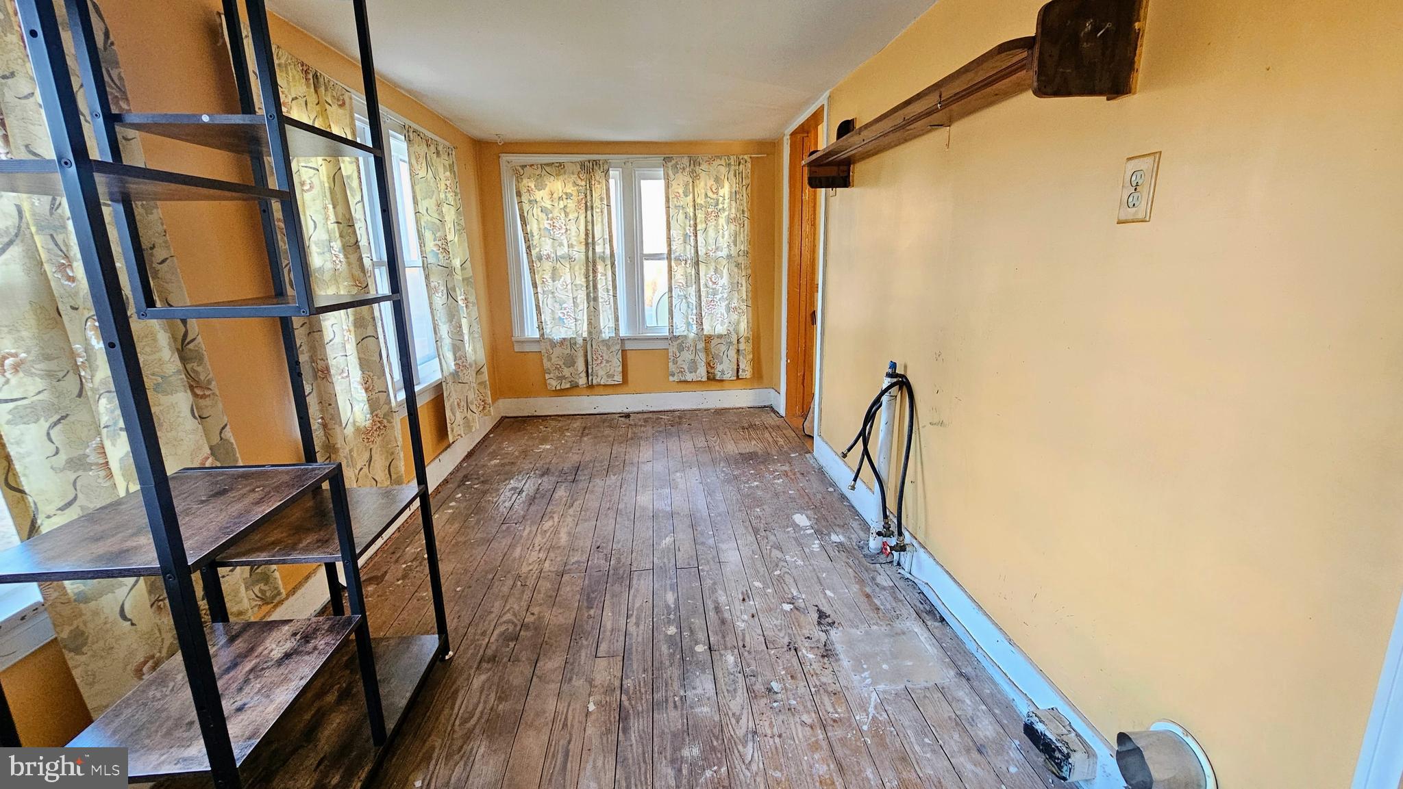 1535 Erney Road Dover, PA 17315 - Photo 8 of 20 a view of an entryway with wooden floor and a window