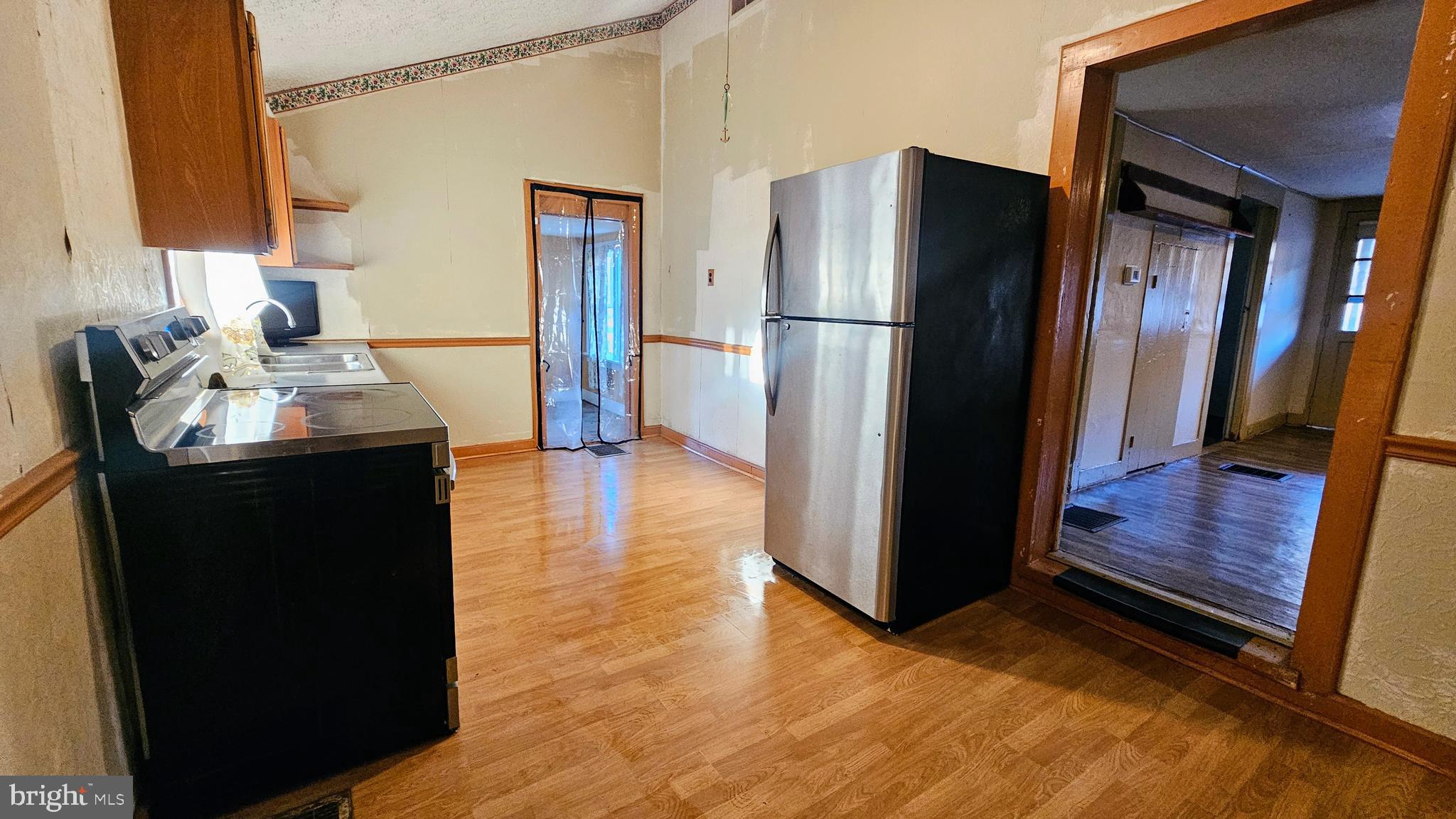 1535 Erney Road Dover, PA 17315 - Photo 10 of 20 a kitchen with stainless steel appliances a refrigerator a stove and a refrigerator