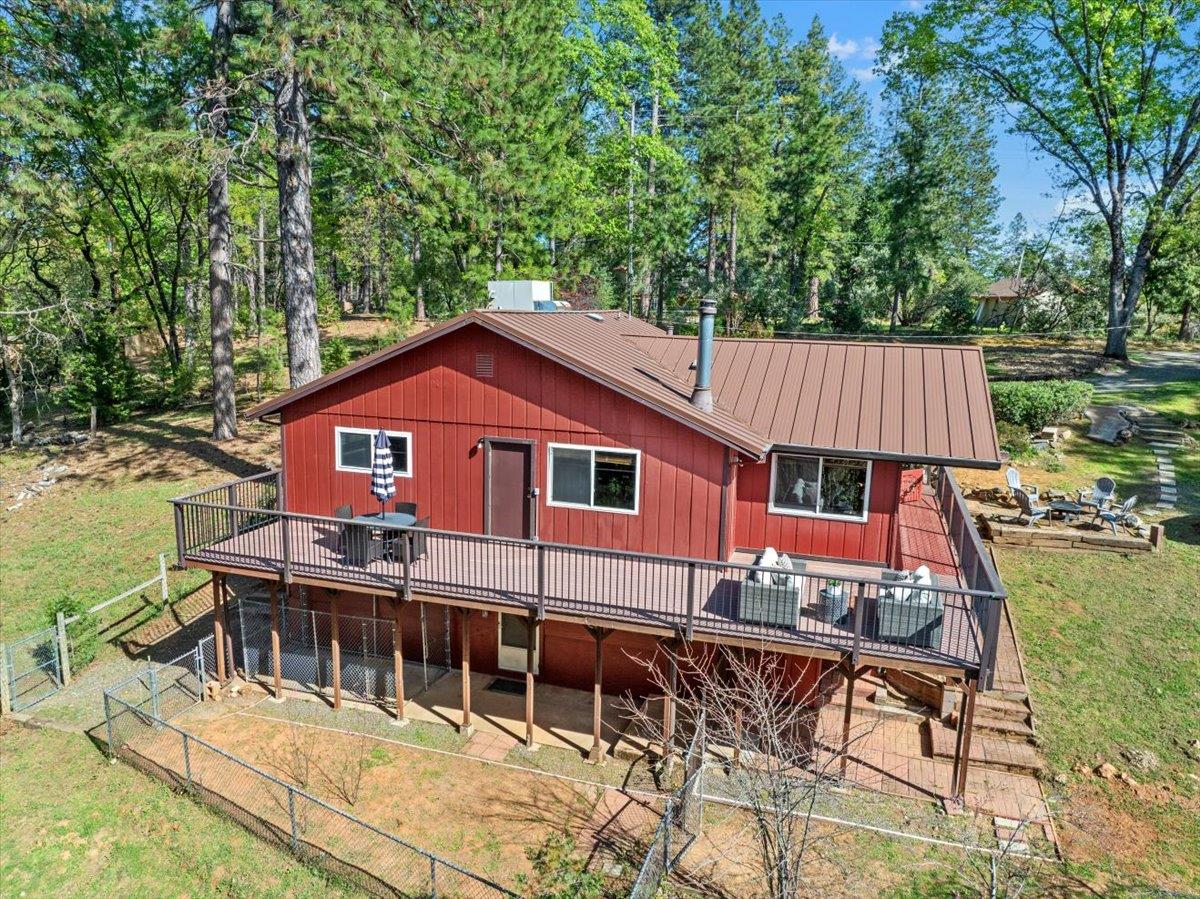 21465 Mason Road Colfax, CA 95713 - Photo 16 of 33 a view of a house with pool and chairs
