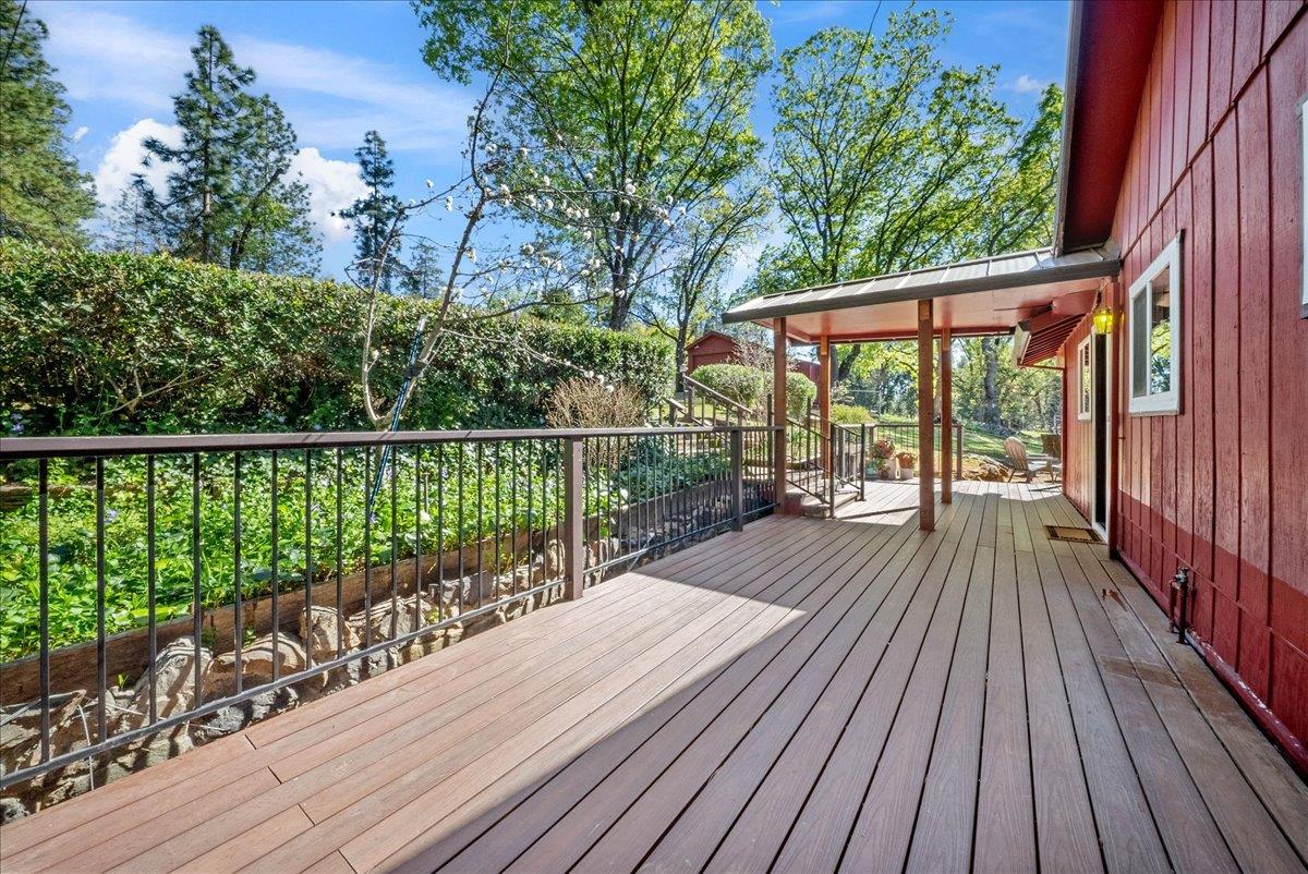 21465 Mason Road Colfax, CA 95713 - Photo 20 of 33 a view of wooden deck and a garden