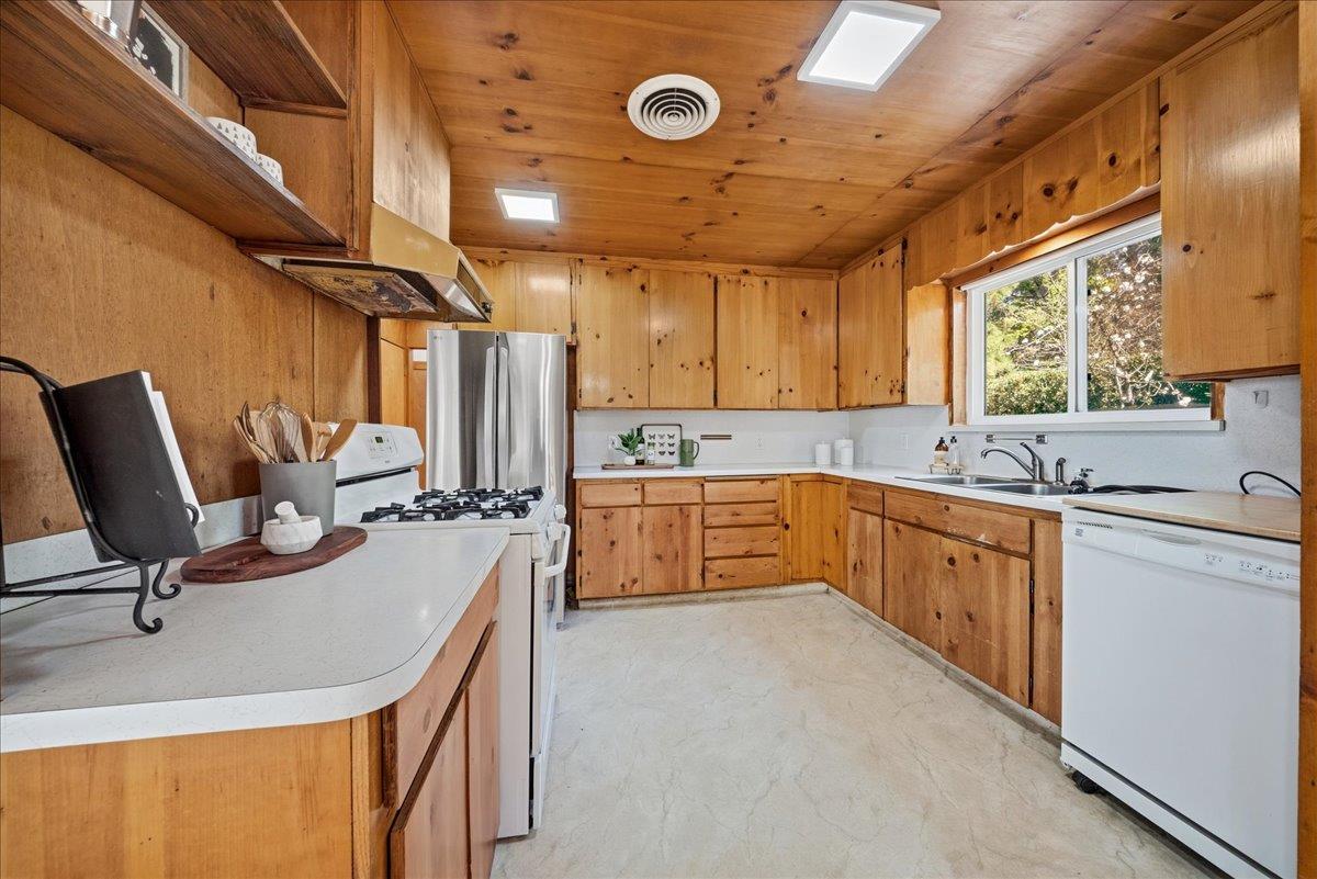 21465 Mason Road Colfax, CA 95713 - Photo 8 of 33 a kitchen with sink cabinets and window