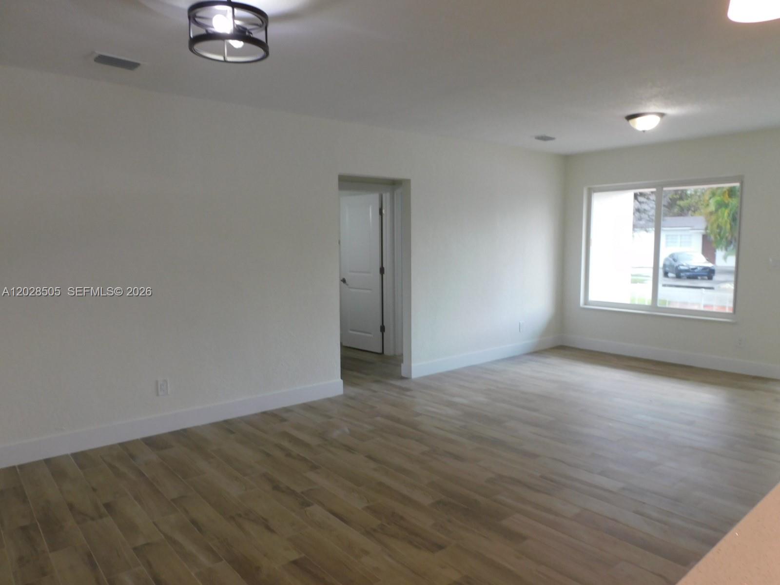 3333 Southwest 89th Avenue Miami, FL 33165 - Photo 6 of 44 Plenty of wall space at social areas.