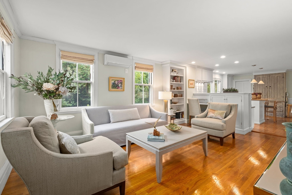 167 Court Street Dedham, MA 02026 - Photo 12 of 42 a living room with furniture and a large window