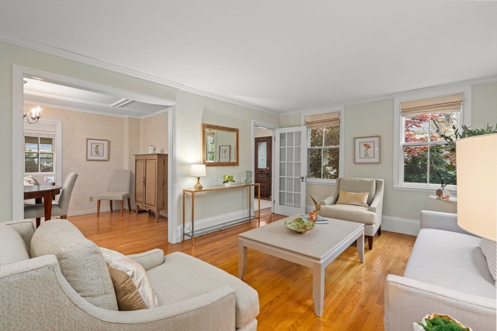 167 Court Street Dedham, MA 02026 - Photo 13 of 42 a living room with furniture and a table
