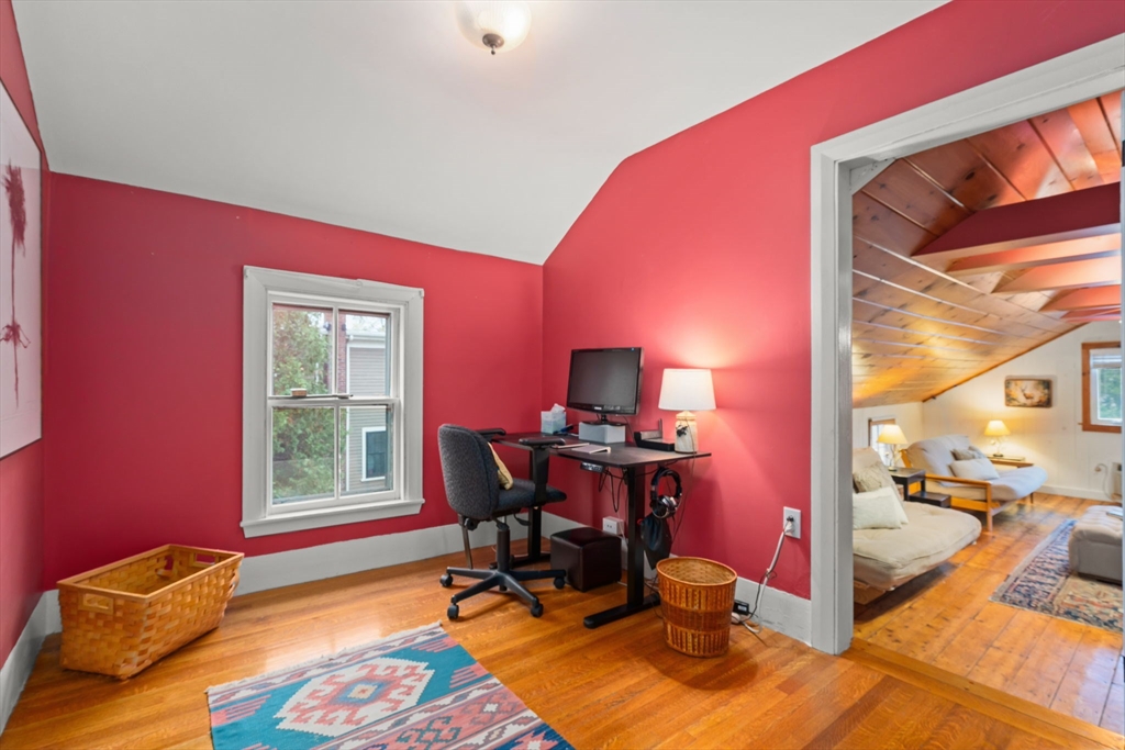 167 Court Street Dedham, MA 02026 - Photo 32 of 42 a view of a workspace with furniture and a window
