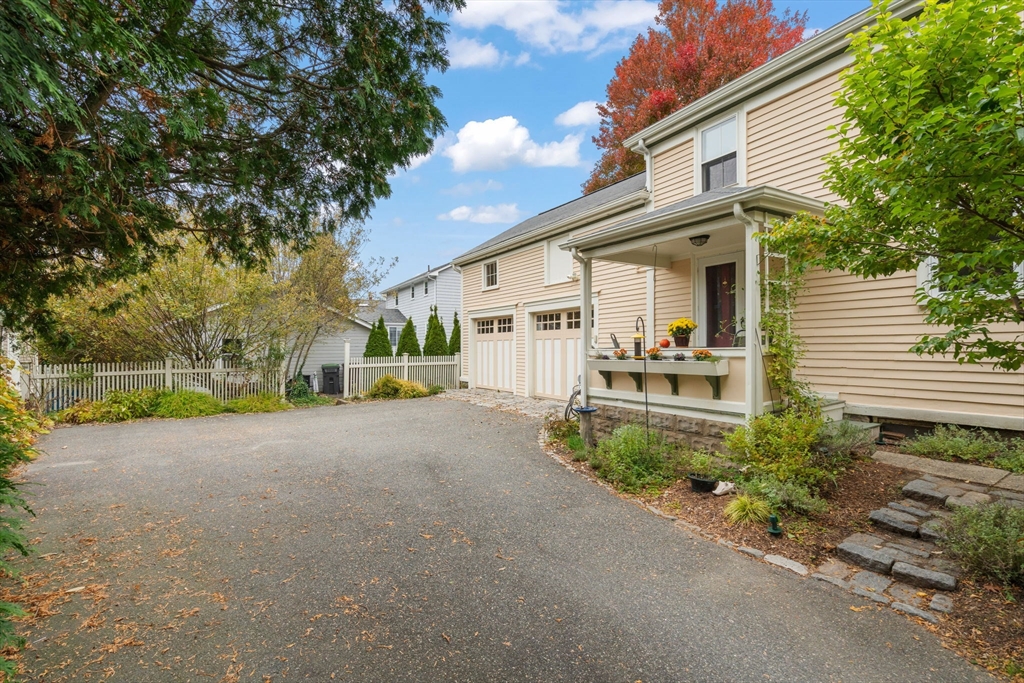 167 Court Street Dedham, MA 02026 - Photo 35 of 42 a view of a house with backyard and trees