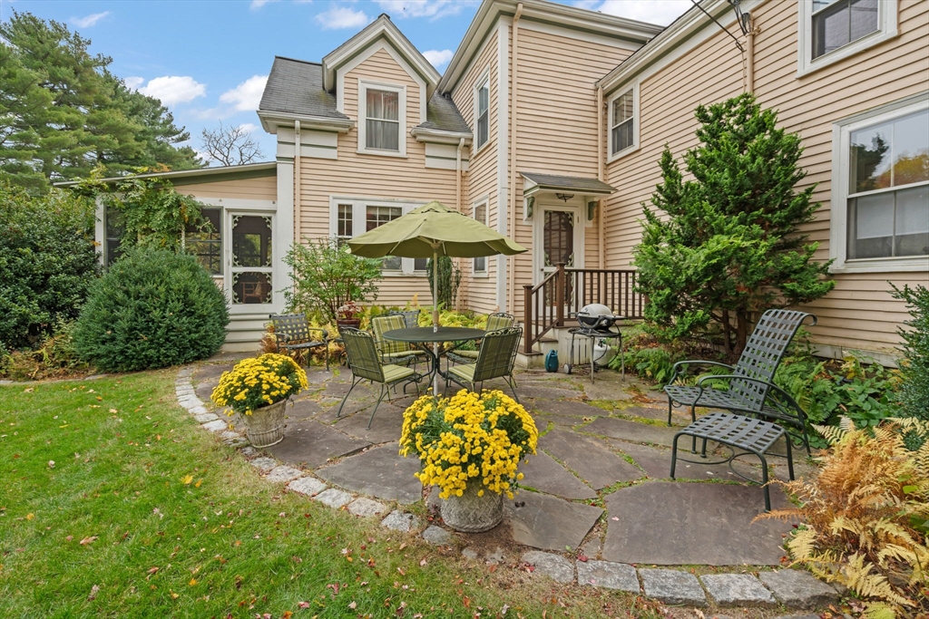 167 Court Street Dedham, MA 02026 - Photo 39 of 42 a view of a house with patio