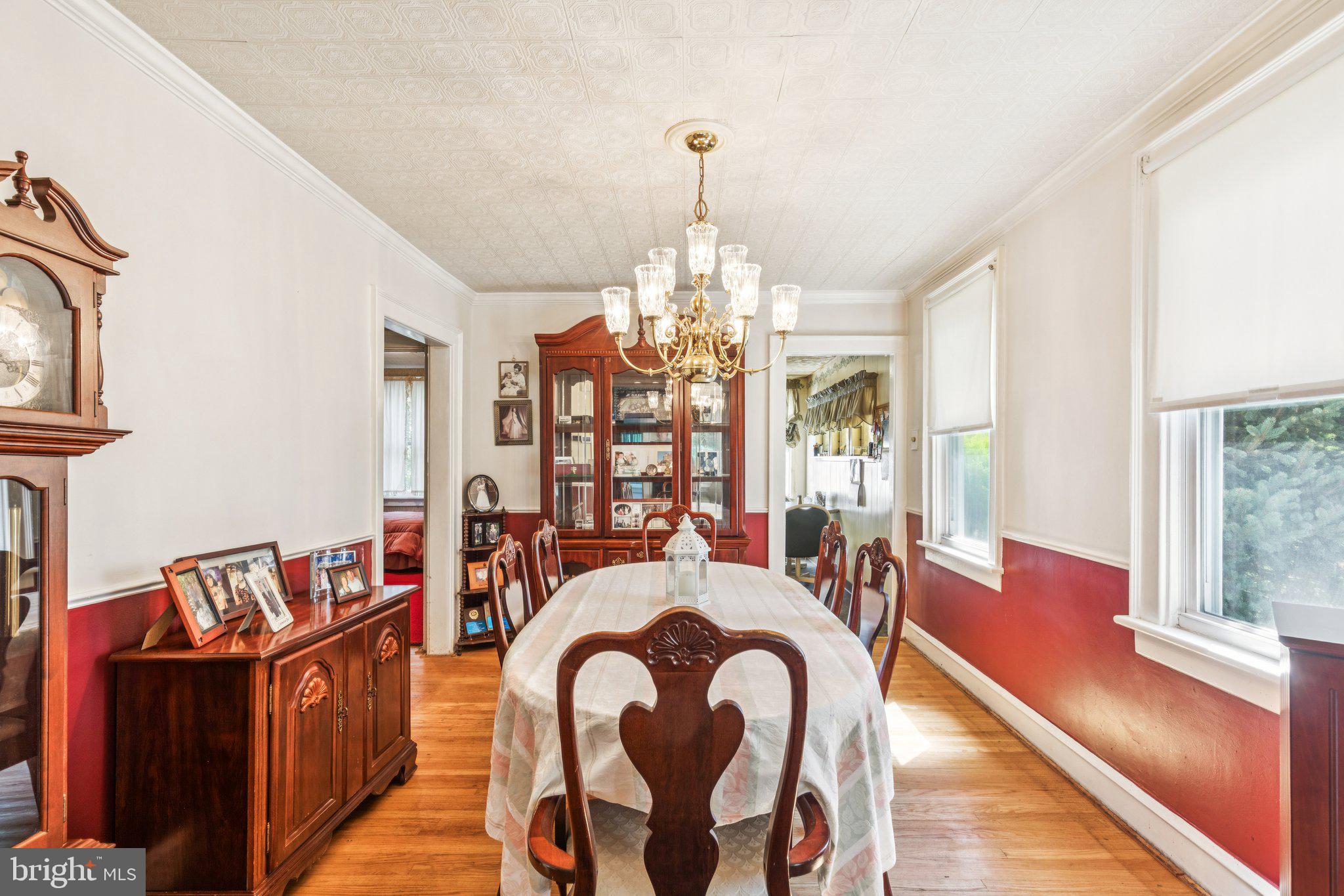 375 Church Road Jenkintown, PA 19046 - Photo 23 of 69 a view of a dining room with furniture and a chandelier