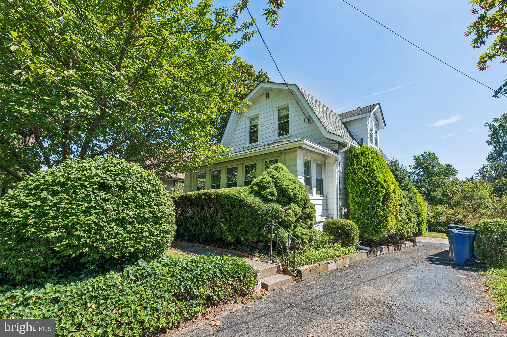 375 Church Road Jenkintown, PA 19046 - Photo 4 of 69 a front view of a house with a yard