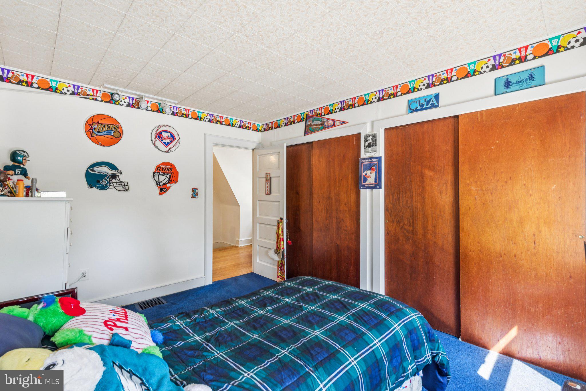 375 Church Road Jenkintown, PA 19046 - Photo 41 of 69 a bedroom with a bed and a refrigerator