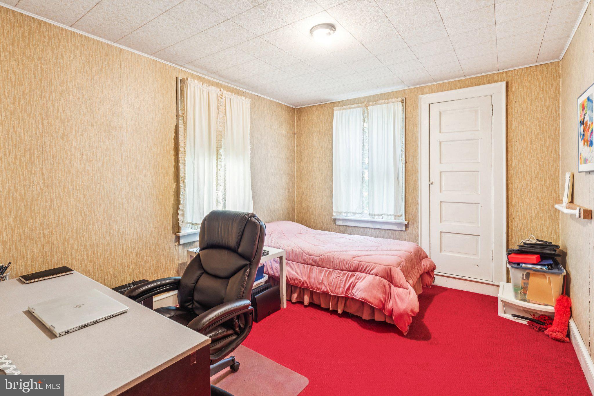 375 Church Road Jenkintown, PA 19046 - Photo 49 of 69 a bedroom with furniture and a large window
