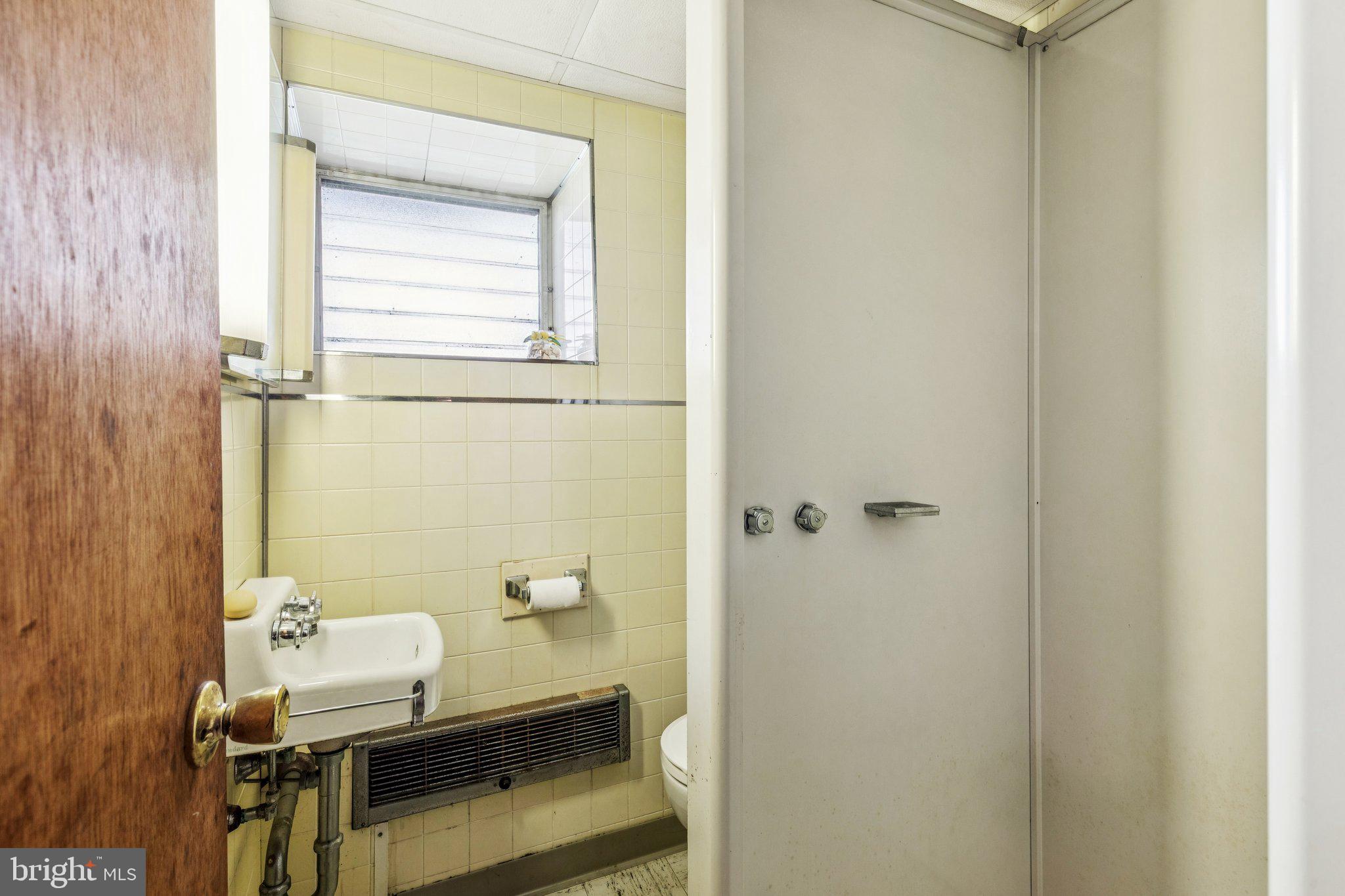375 Church Road Jenkintown, PA 19046 - Photo 58 of 69 a bathroom with a sink and a toilet