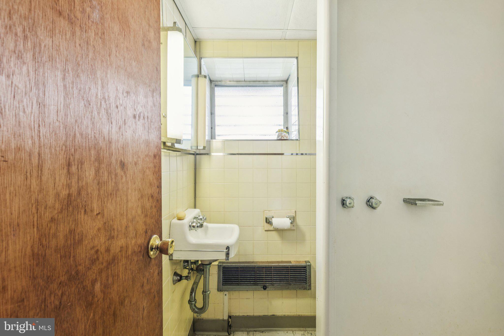 375 Church Road Jenkintown, PA 19046 - Photo 59 of 69 a bathroom with a sink and a mirror