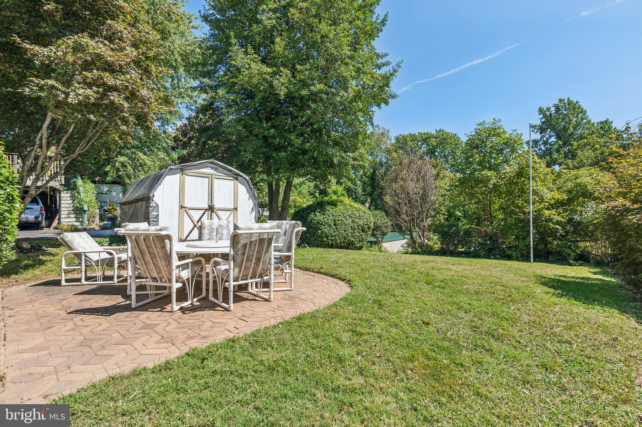 375 Church Road Jenkintown, PA 19046 - Photo 64 of 69 a view of a house with backyard and a sitting area