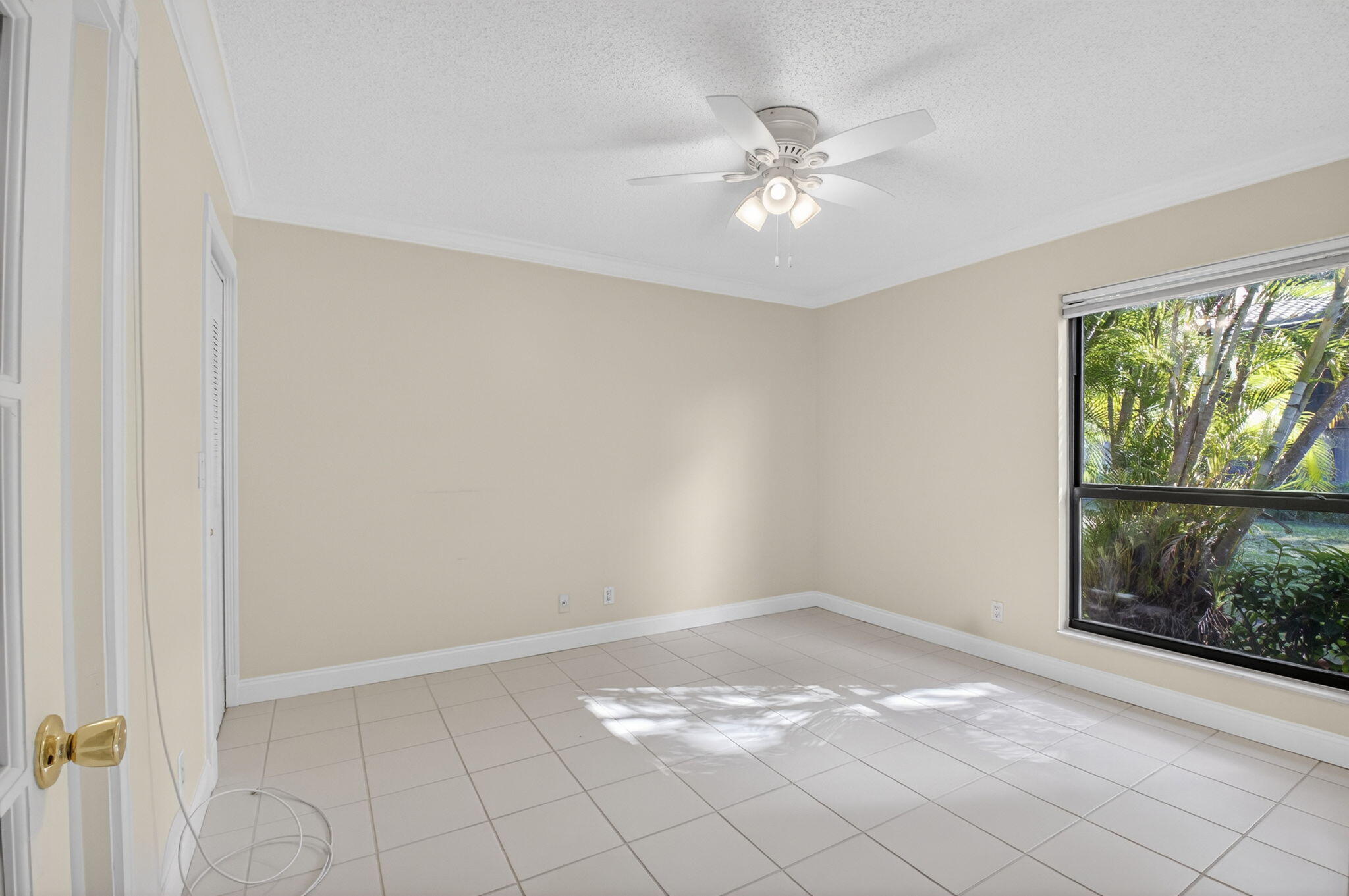 159 Northwest 70th Street, Unit 403 Boca Raton, FL 33487 - Photo 15 of 31 a view of an empty room with a window