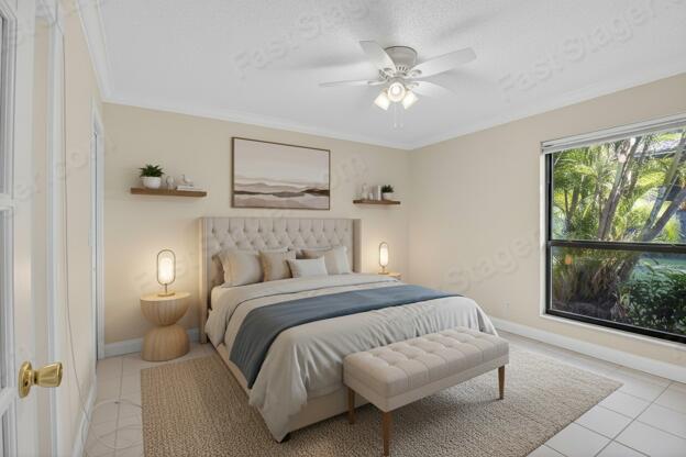 159 Northwest 70th Street, Unit 403 Boca Raton, FL 33487 - Photo 16 of 31 a bedroom with a large bed and a window