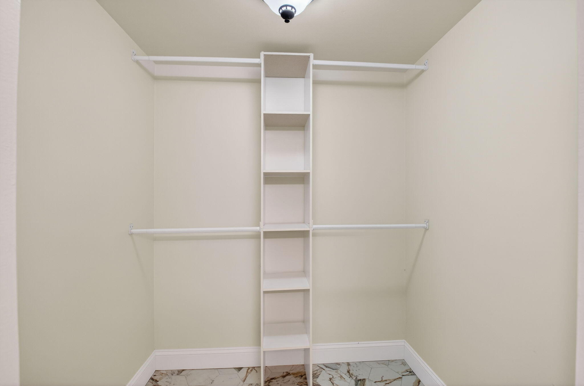 159 Northwest 70th Street, Unit 403 Boca Raton, FL 33487 - Photo 19 of 31 a view of an empty walk in closet