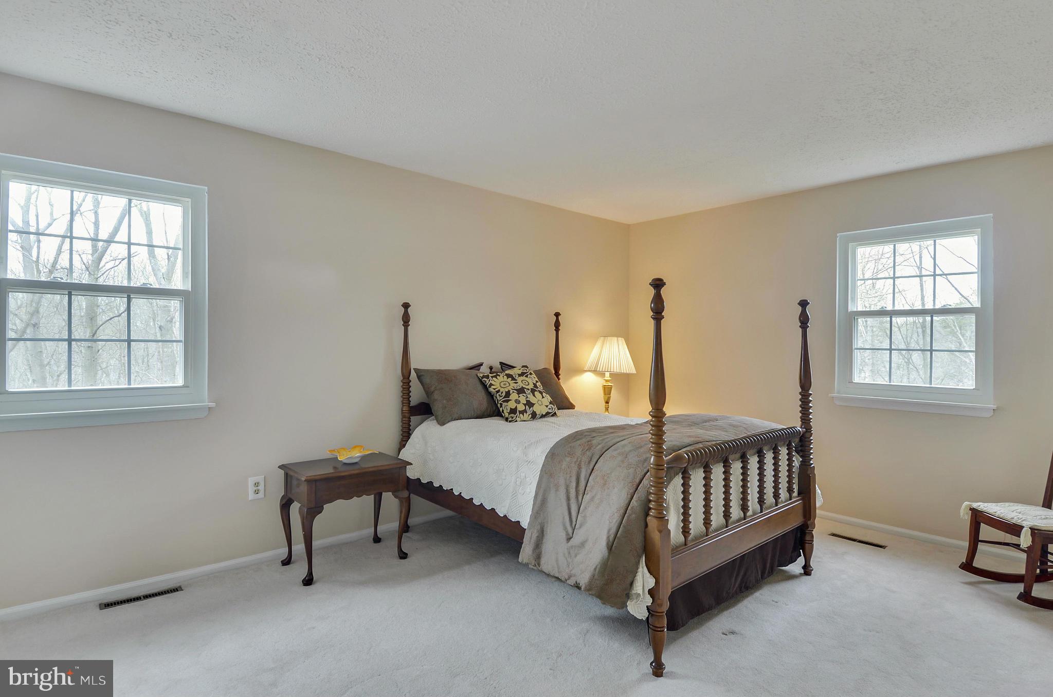 1922 Buckthorn Lane Reston, VA 20191 - Photo 18 of 30 a bed room with a bed and a window