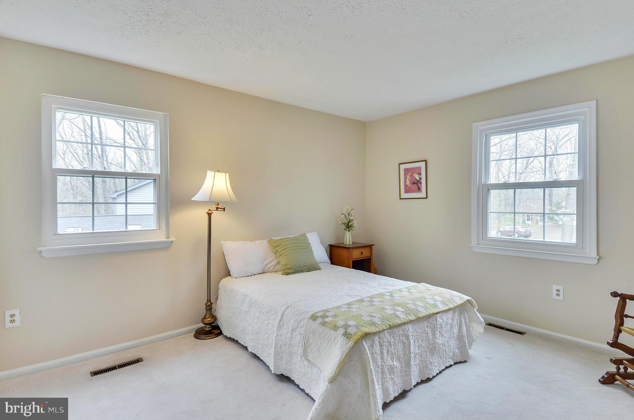 1922 Buckthorn Lane Reston, VA 20191 - Photo 19 of 30 a bedroom with a bed and a window