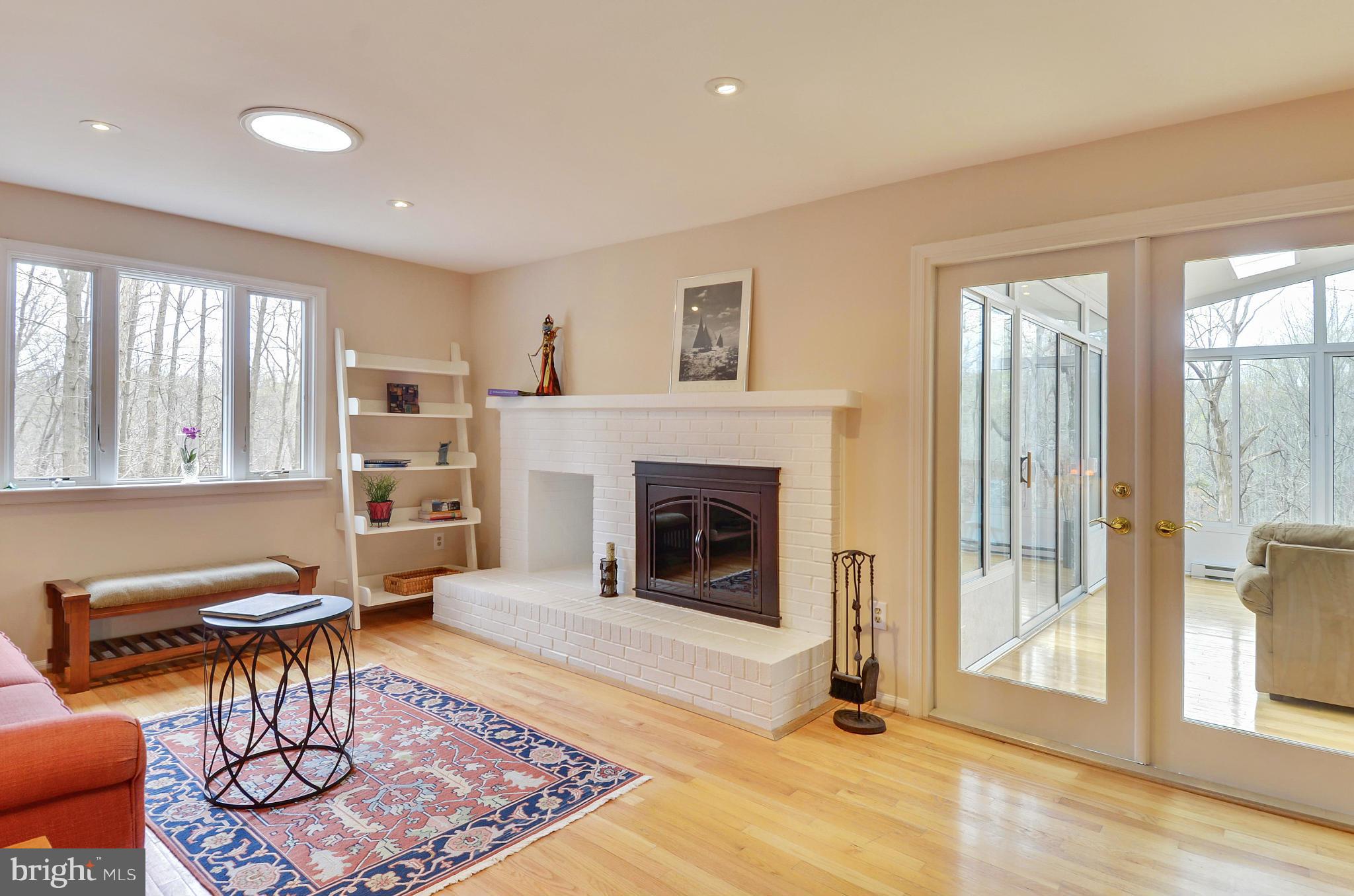 1922 Buckthorn Lane Reston, VA 20191 - Photo 4 of 30 a living room with furniture and a fireplace