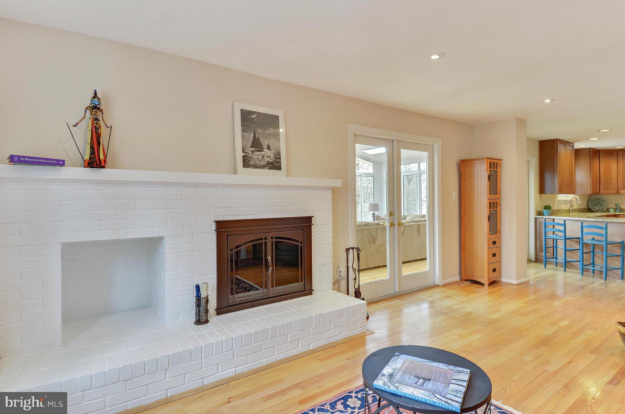 1922 Buckthorn Lane Reston, VA 20191 - Photo 5 of 30 a living room with furniture and a fireplace
