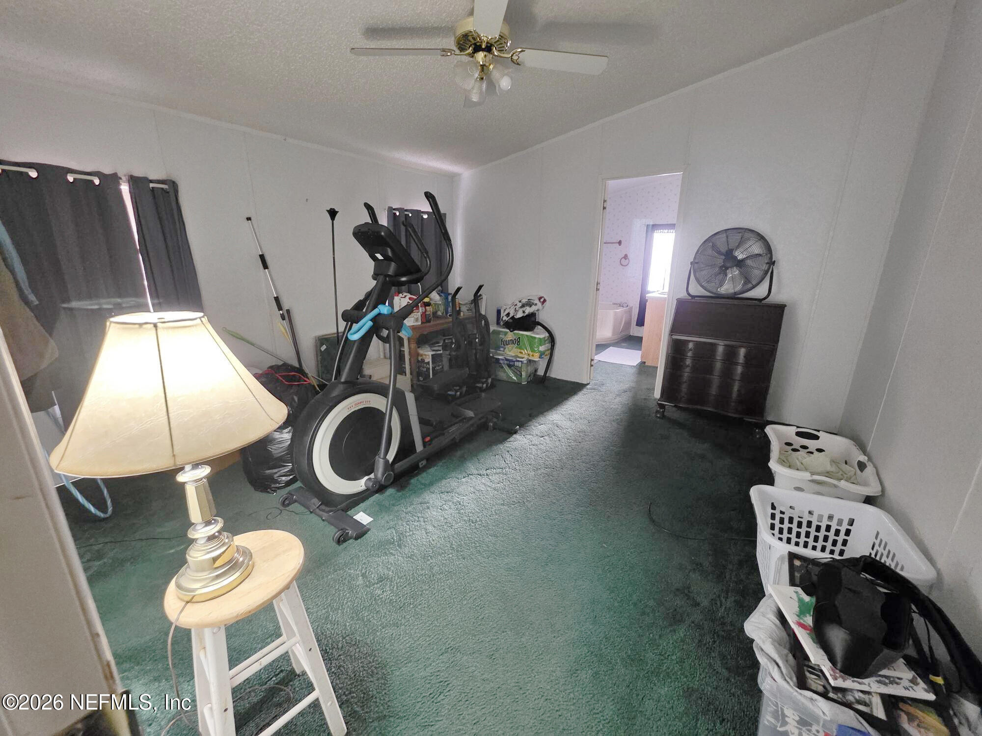 44680 Artesian Boulevard Callahan, FL 32011 - Photo 25 of 47 a view of a room with gym equipment