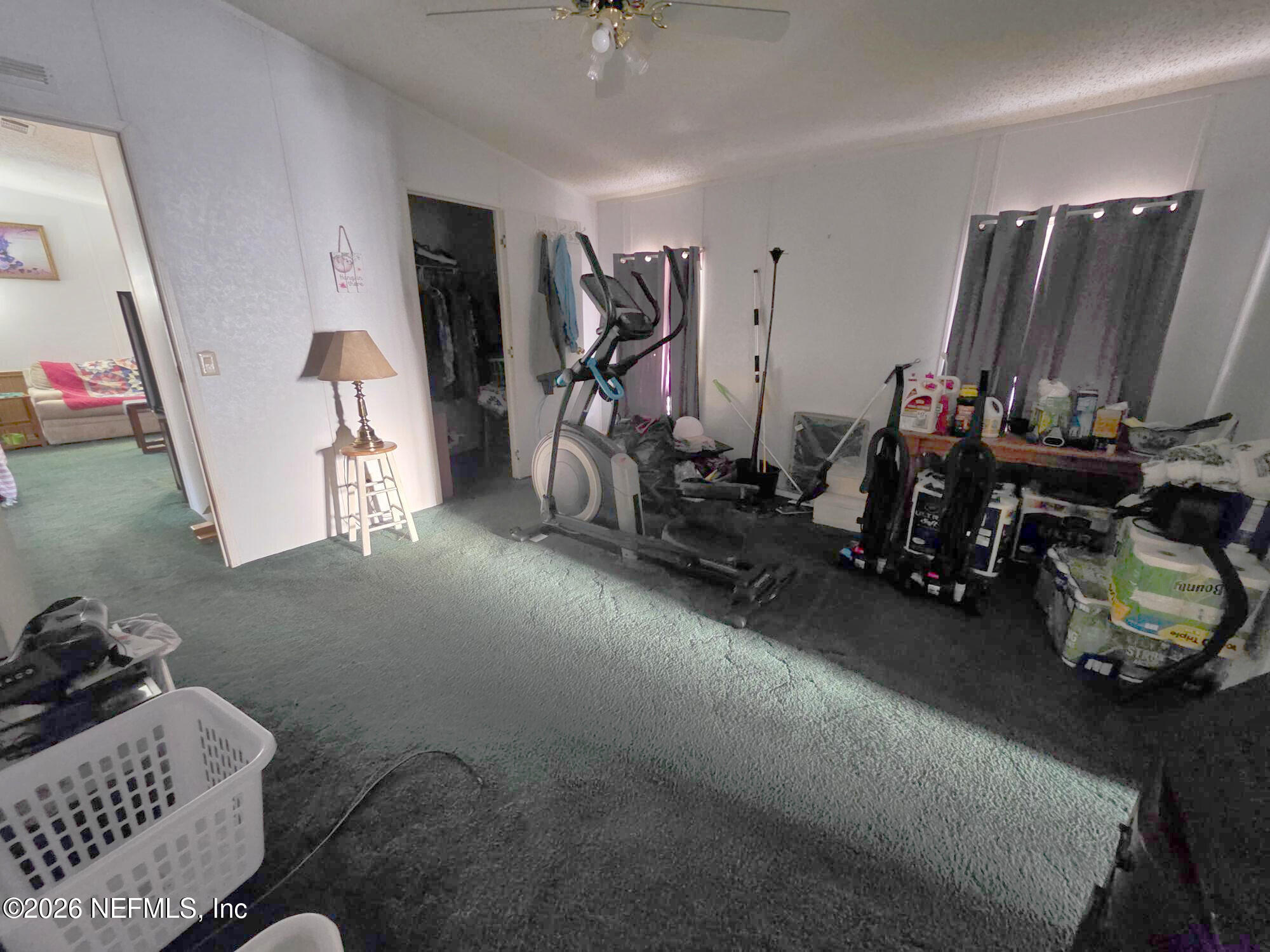44680 Artesian Boulevard Callahan, FL 32011 - Photo 26 of 47 a view of a room with gym equipment