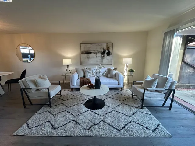a living room with furniture and view of living room