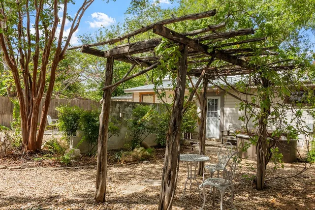 a backyard of a house with lots of green space