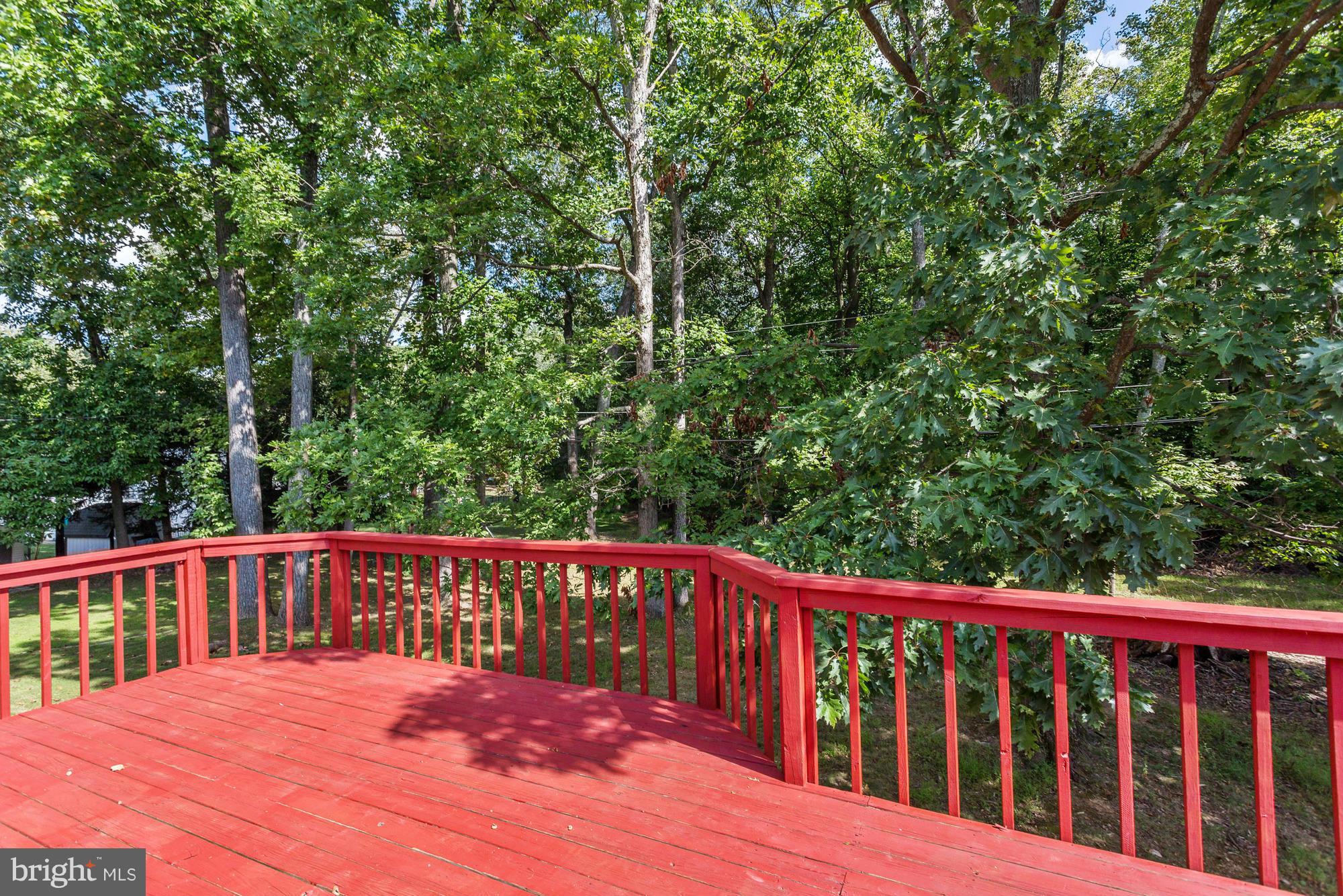 9405 Tulsemere Road Randallstown, MD 21133 - Photo 20 of 26 a view of a wooden roof deck